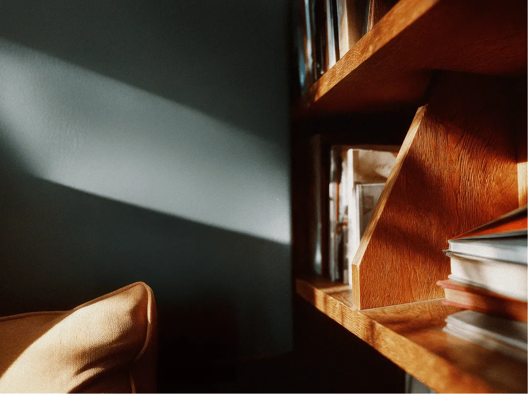 Section background — warm wood detail